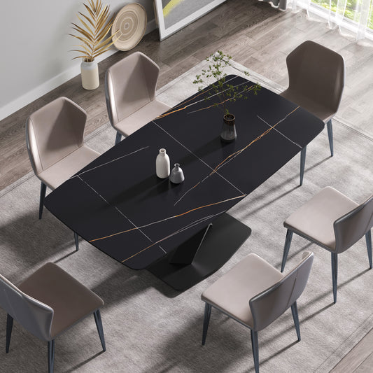 Modern black marble dining table with gold veining and six taupe upholstered chairs