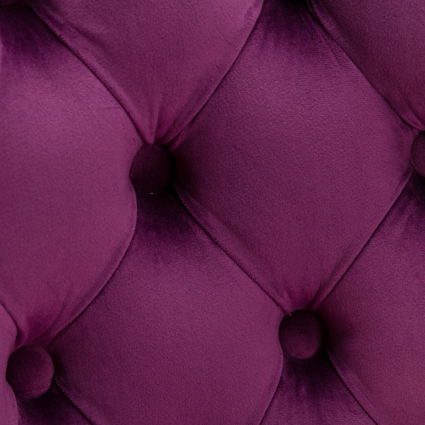Deep purple velvet tufted upholstery fabric with diamond stitching