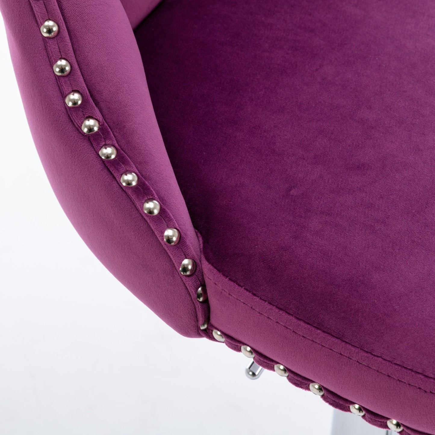 Plush purple velvet stool with silver stud trim detail