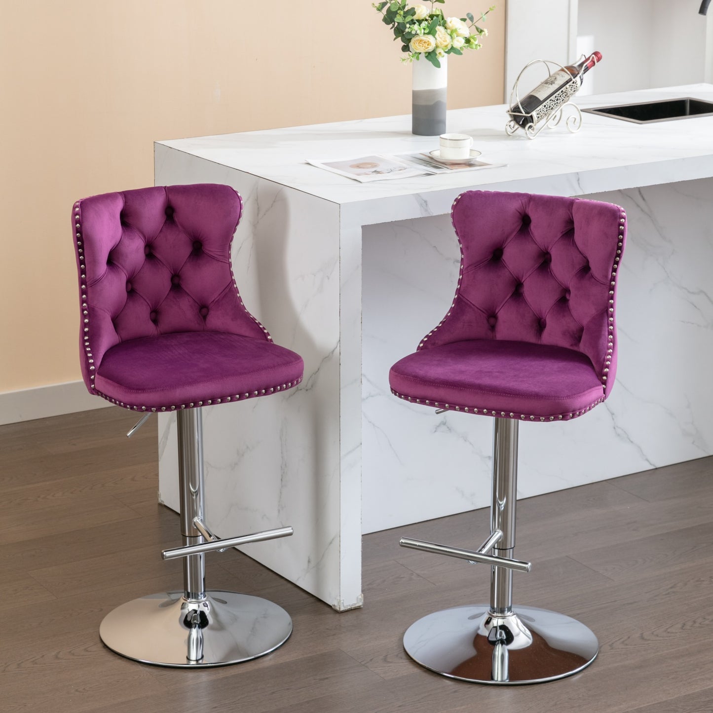 Plush purple velvet bar stool with tufted back and chrome base