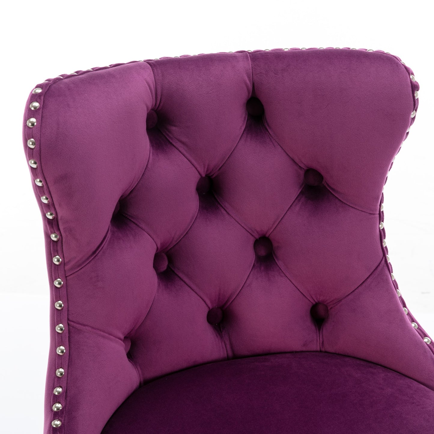 Plush purple velvet accent chair with diamond tufting and silver nailhead trim