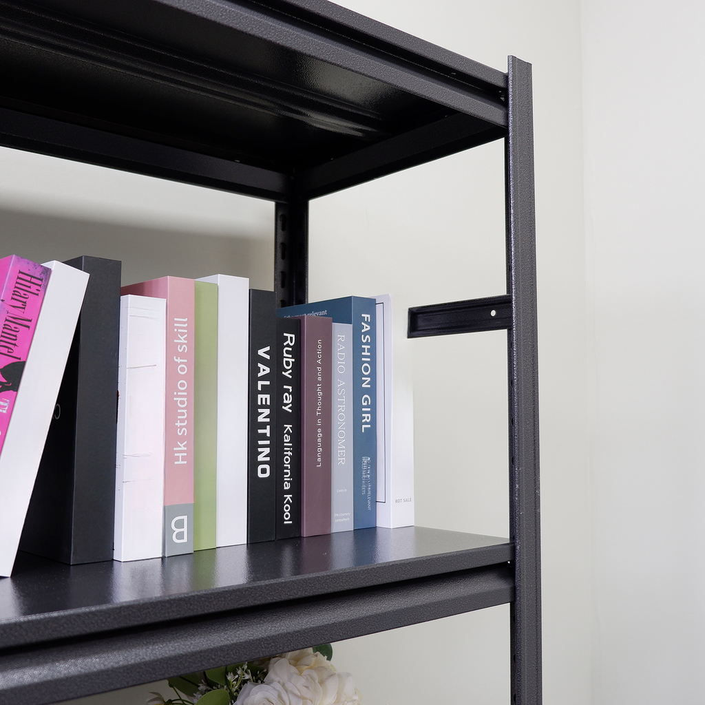 Black metal shelving unit displaying a row of books