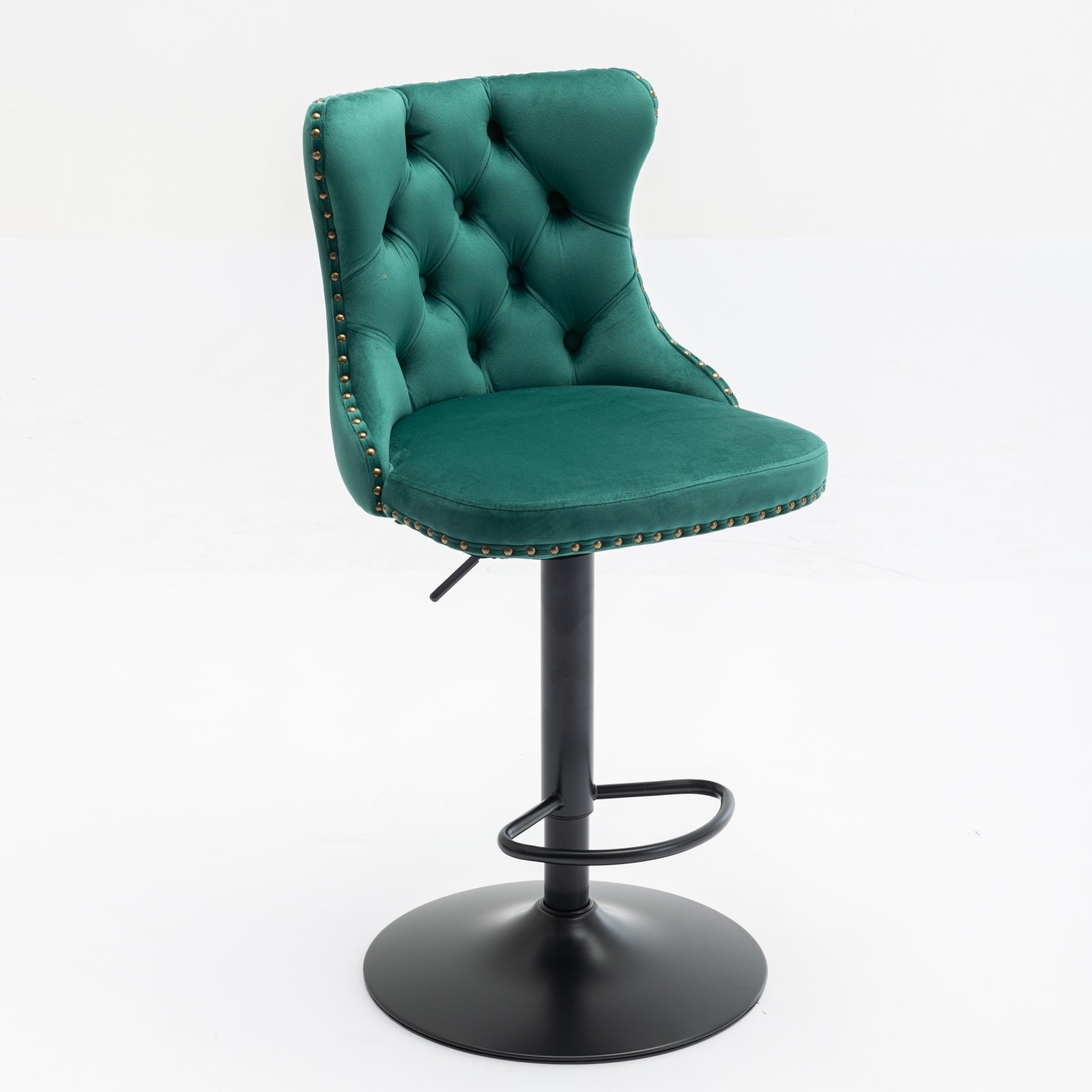 Emerald green velvet bar stool with tufted back and brass nailhead trim