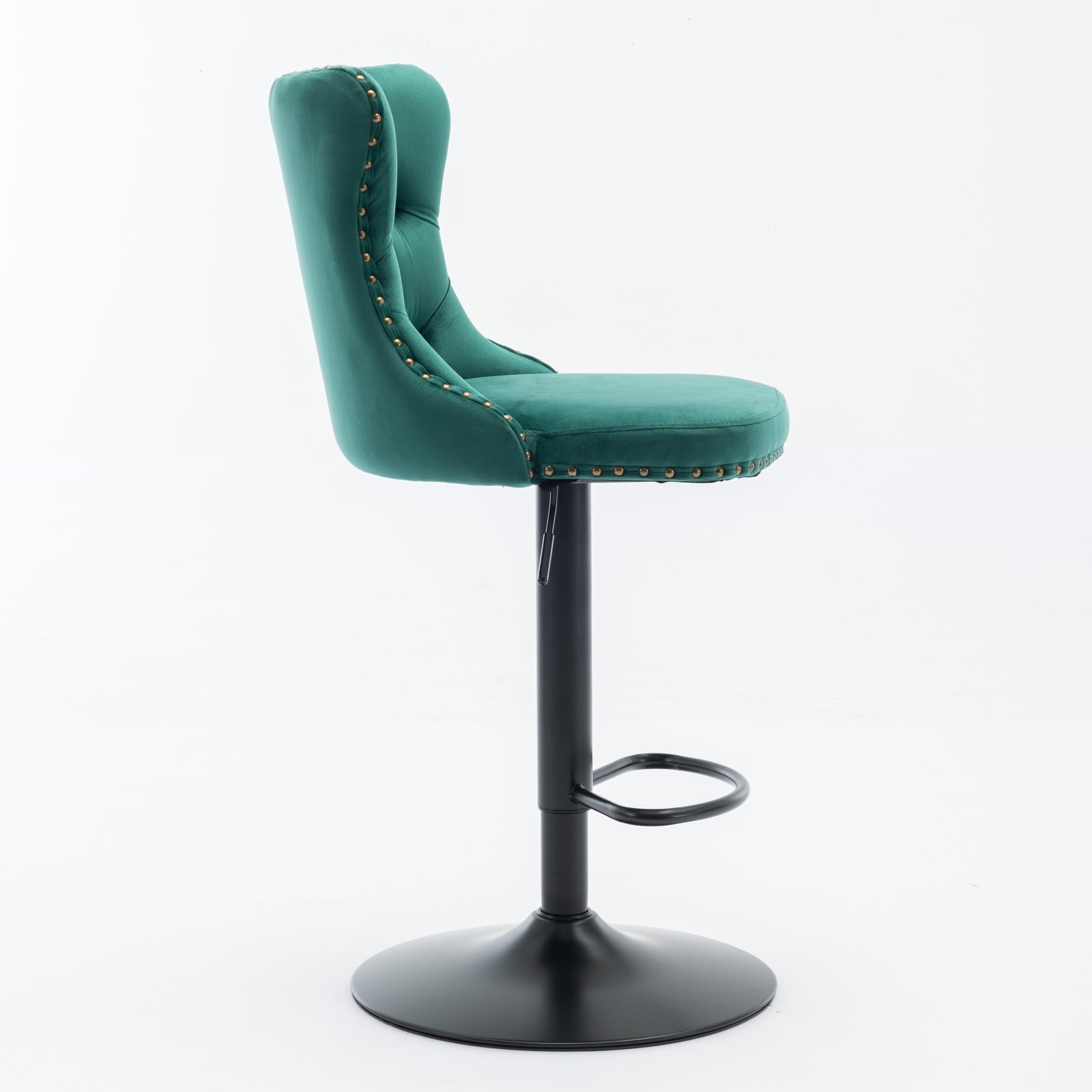 Green velvet bar stool with gold stud accents and black adjustable base