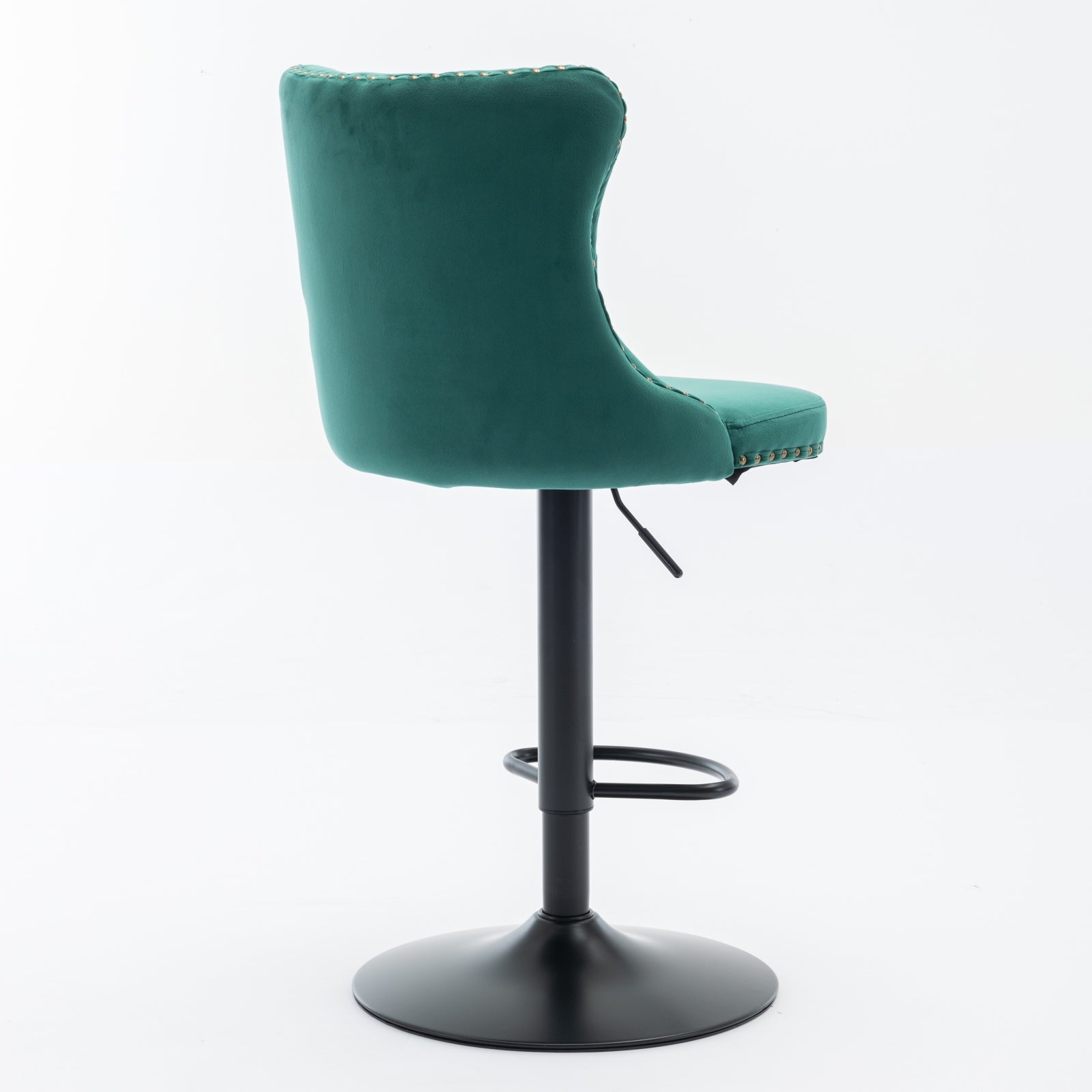Emerald green velvet bar stool with gold nailhead trim