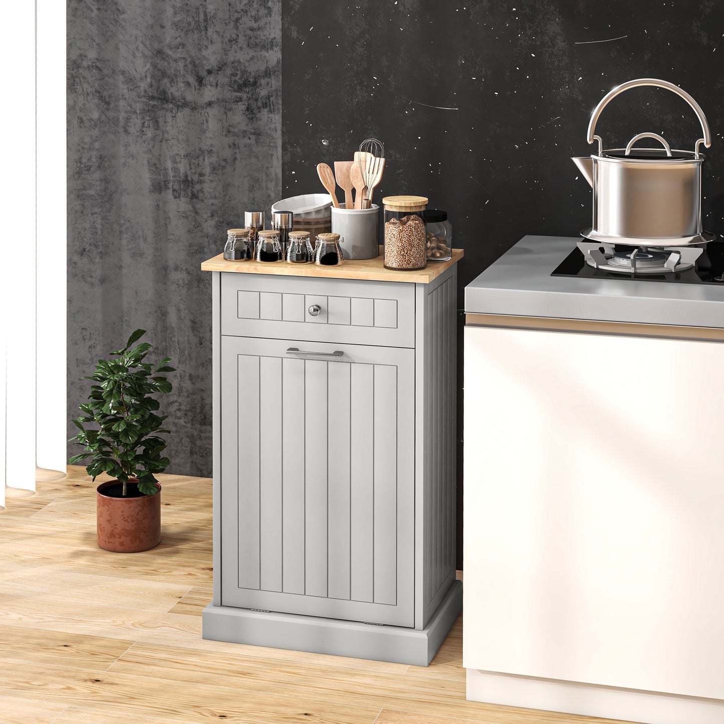 Gray kitchen bin cabinet with wooden top and drawer