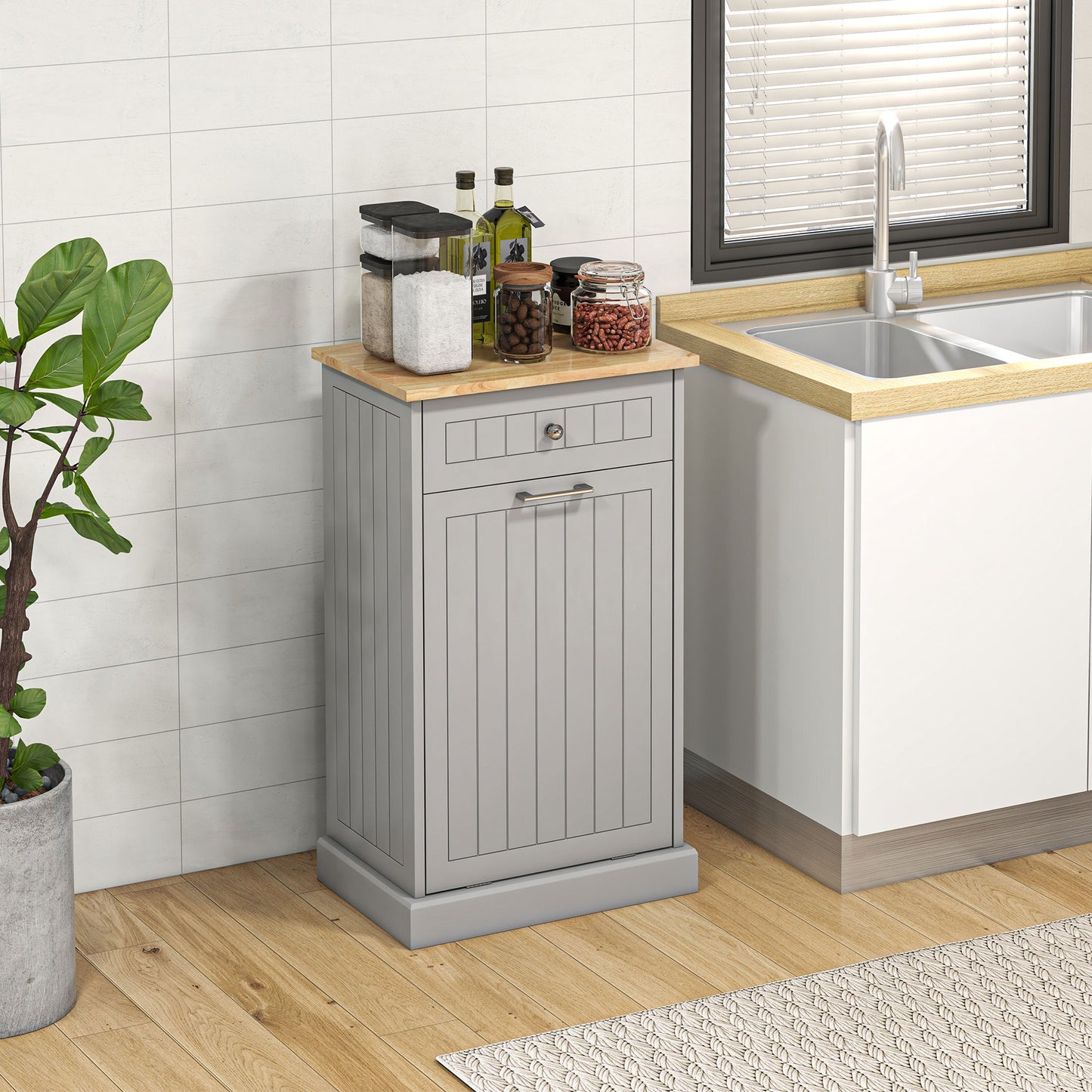 Grey kitchen trash can with drawer and wooden top