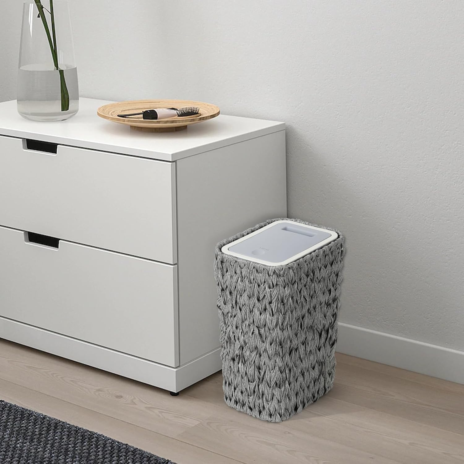 Woven grey laundry basket with white lid