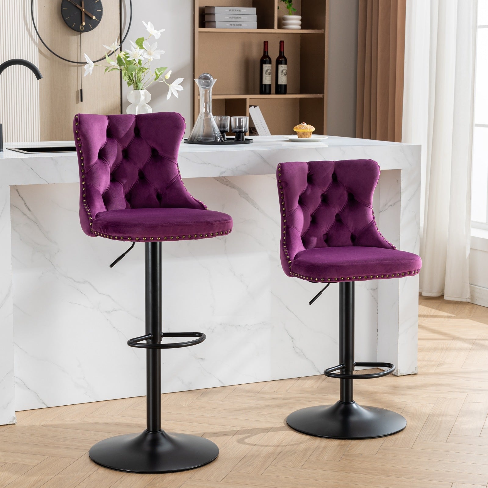 Tufted purple velvet bar stool with brass nailhead trim and adjustable height