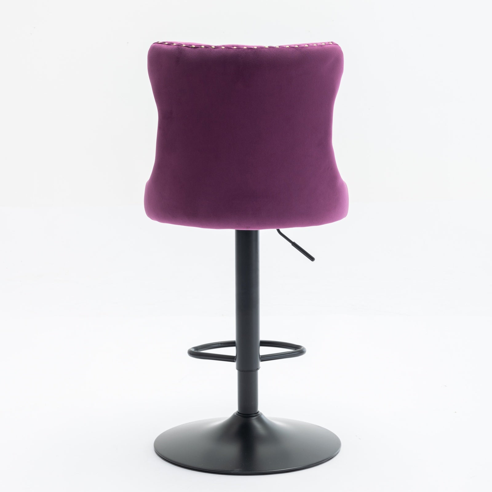 Plush purple velvet bar stool with decorative nailhead trim and adjustable height