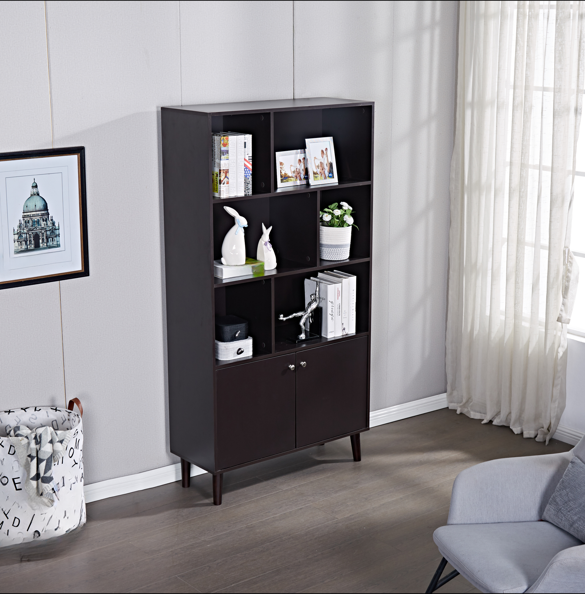 Dark brown wooden bookshelf with open shelves and two cabinet doors