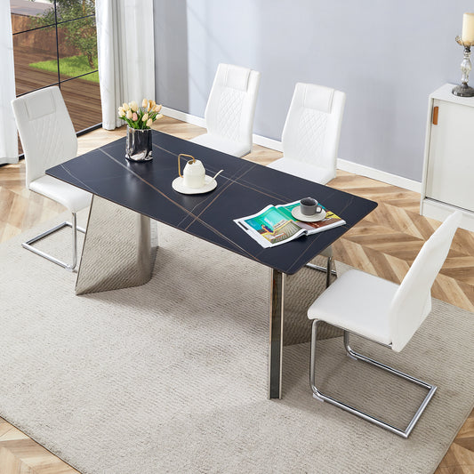 Modern black dining table with chrome base and white upholstered chairs