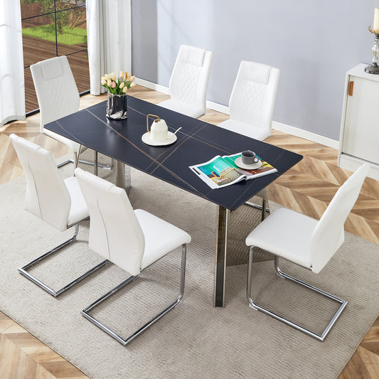 Modern dining set with black marble top table and six white leather chairs