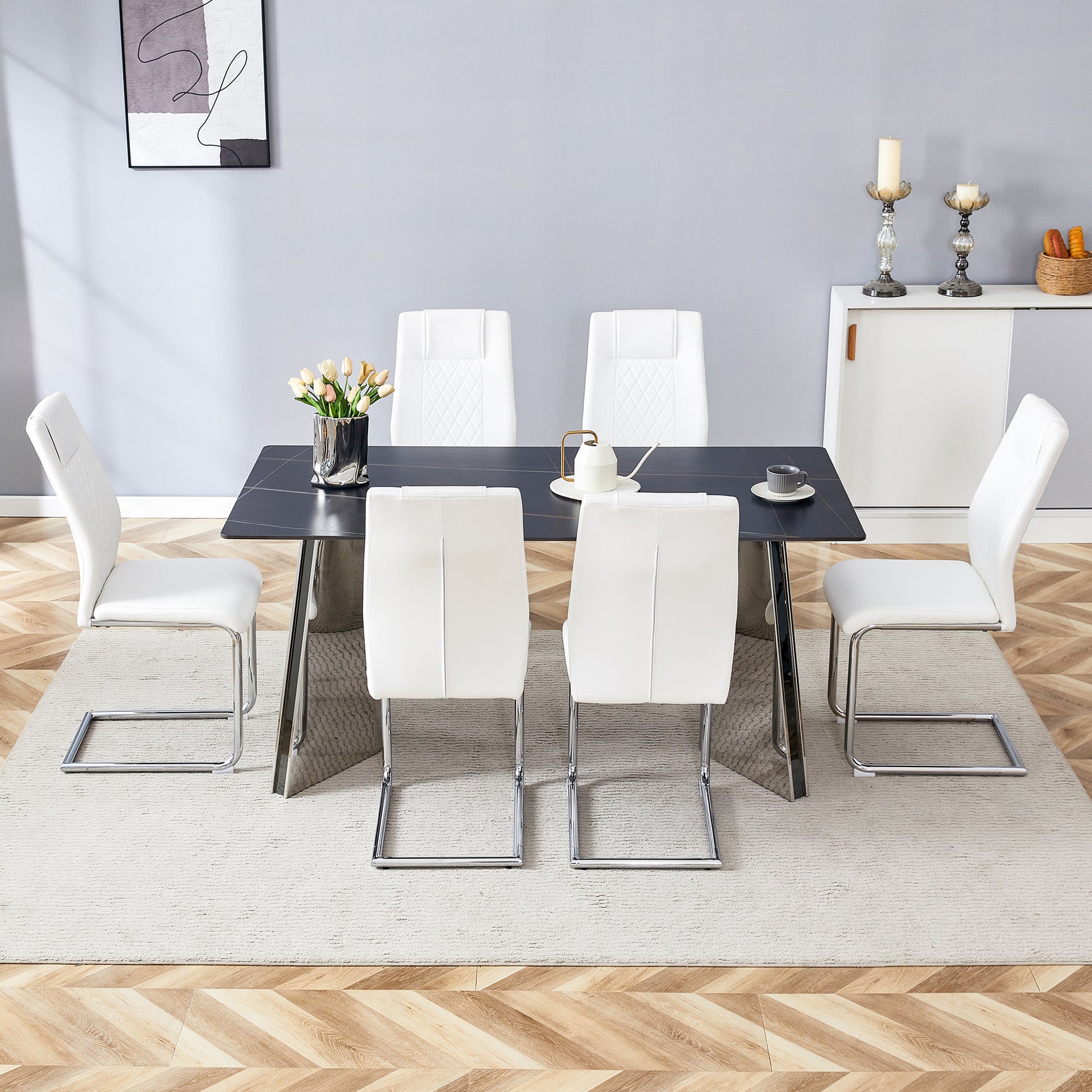 White faux leather dining chairs with chrome sled legs