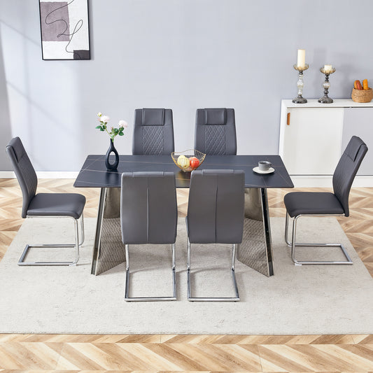 Set of  dark gray faux leather dining chairs with chrome legs diamond stitching and modern design
