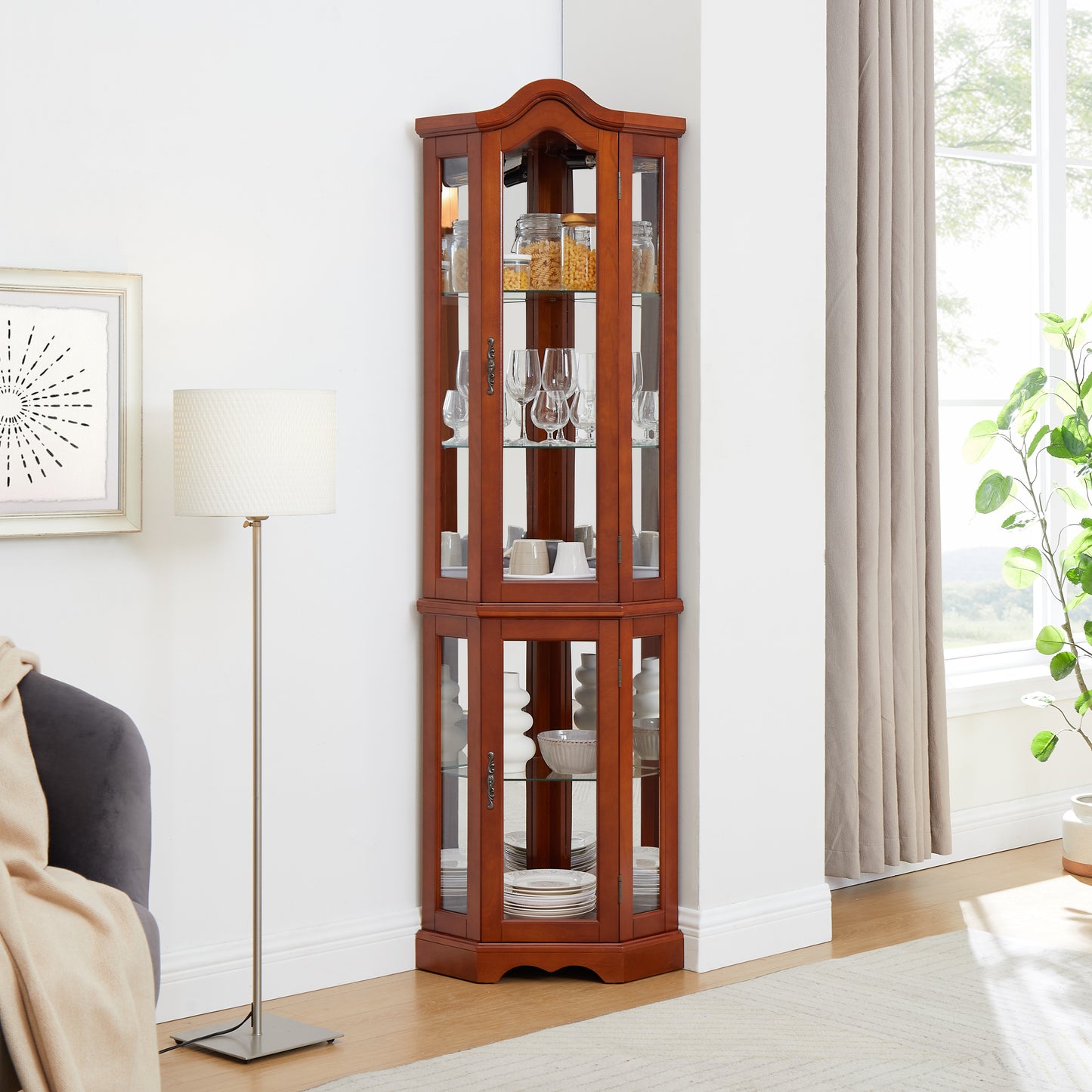 Cherry finish corner curio cabinet with glass doors and shelves
