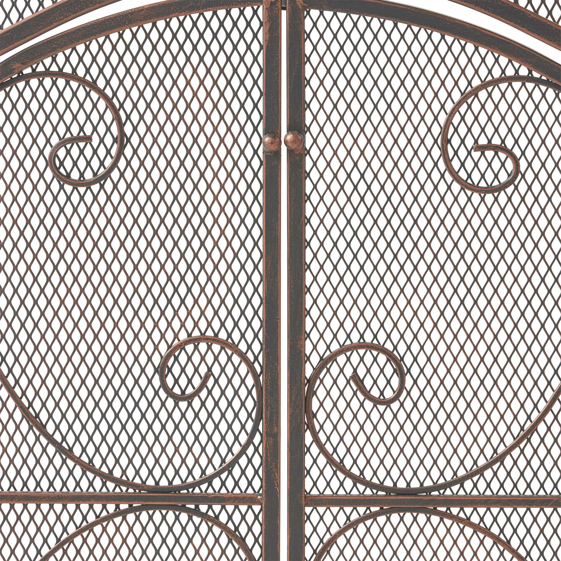 Ornate bronze garden gate with scrollwork and diamond mesh