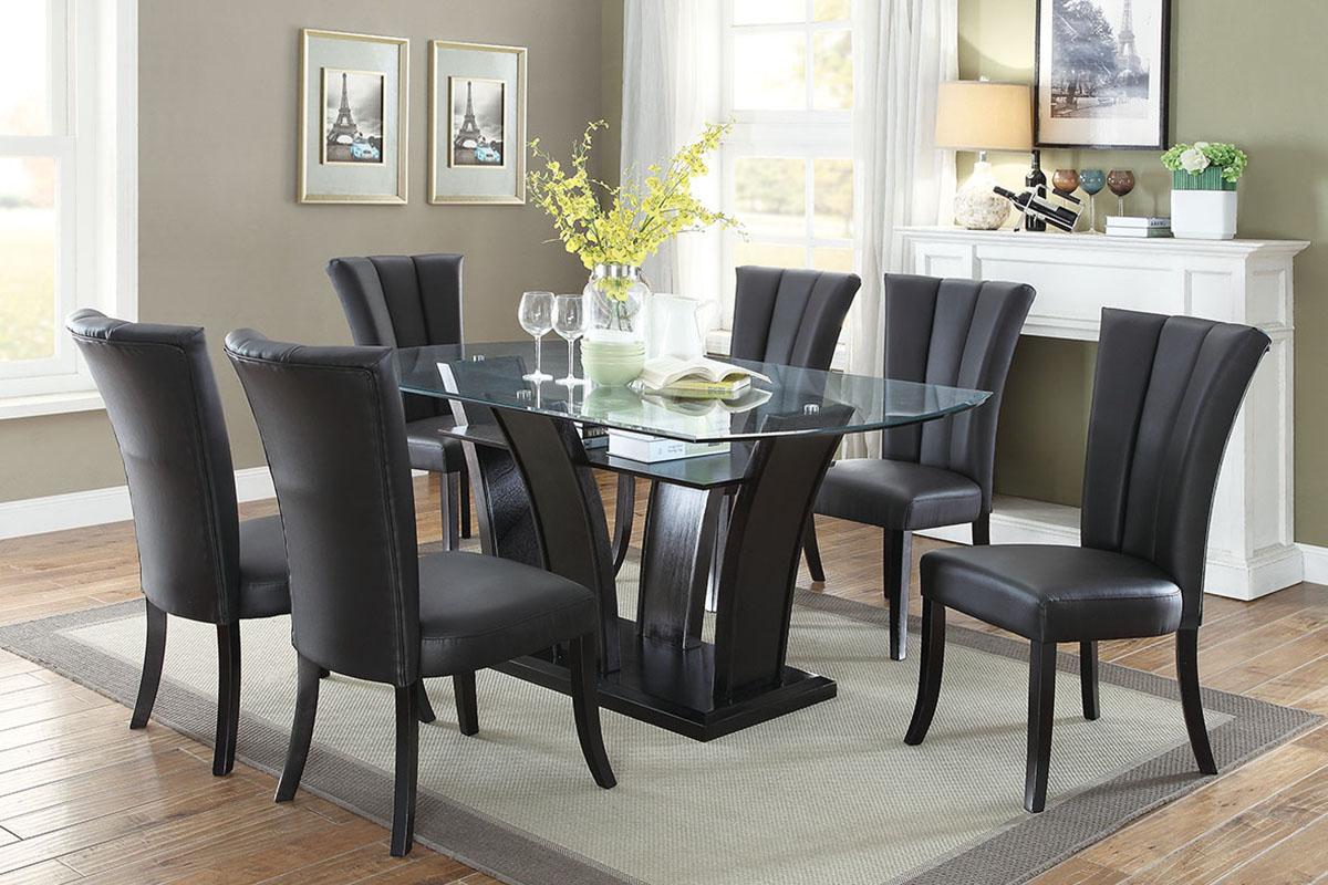 Modern black faux leather dining chairs with padded seats and backs