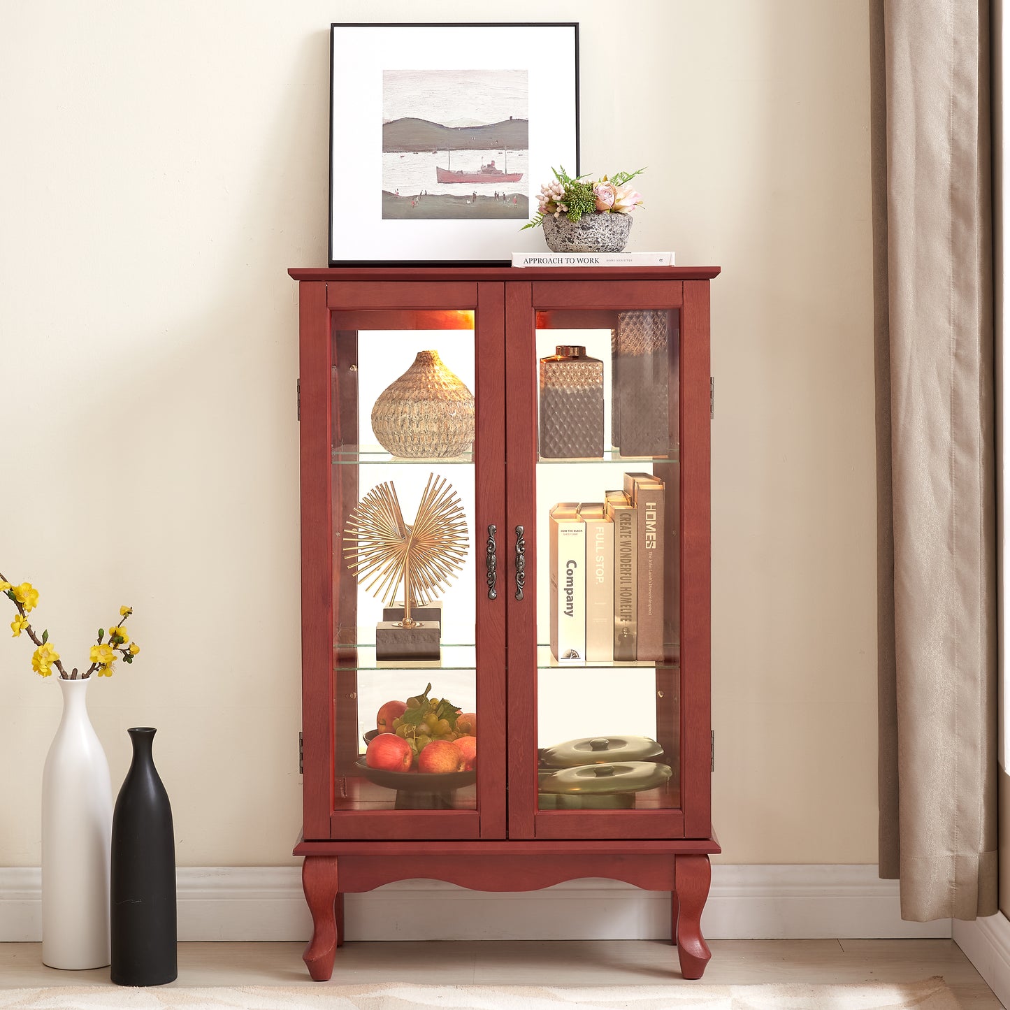 Red wooden accent cabinet with glass doors and decorative handles