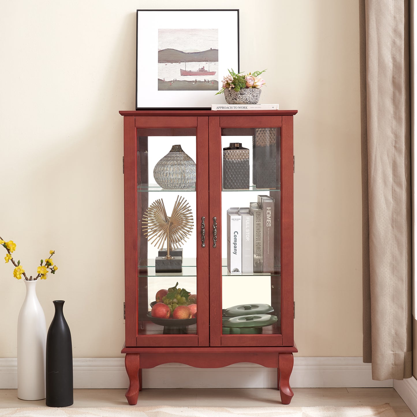 Red glass display cabinet with decorative items and fruit