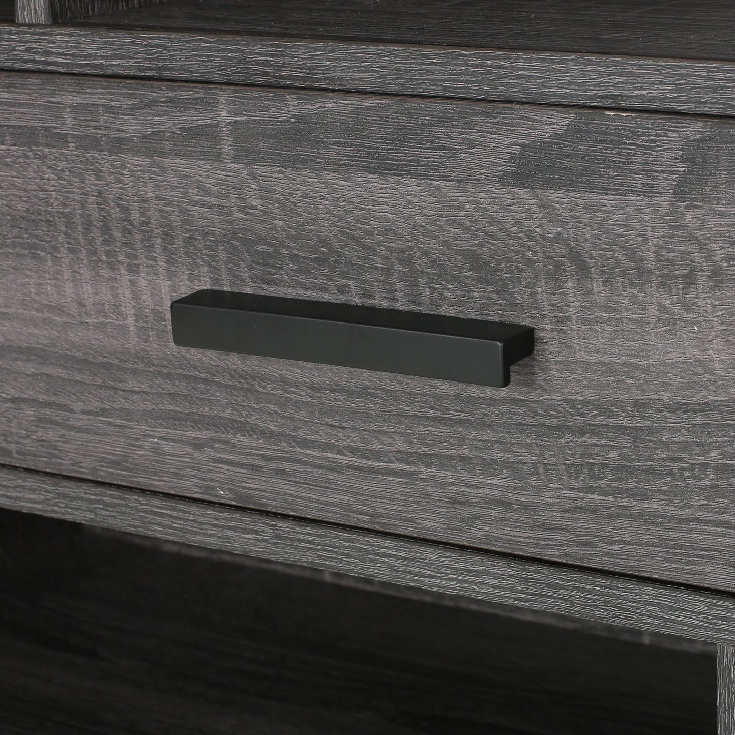 Dark grey wood grain dresser drawer with black handle