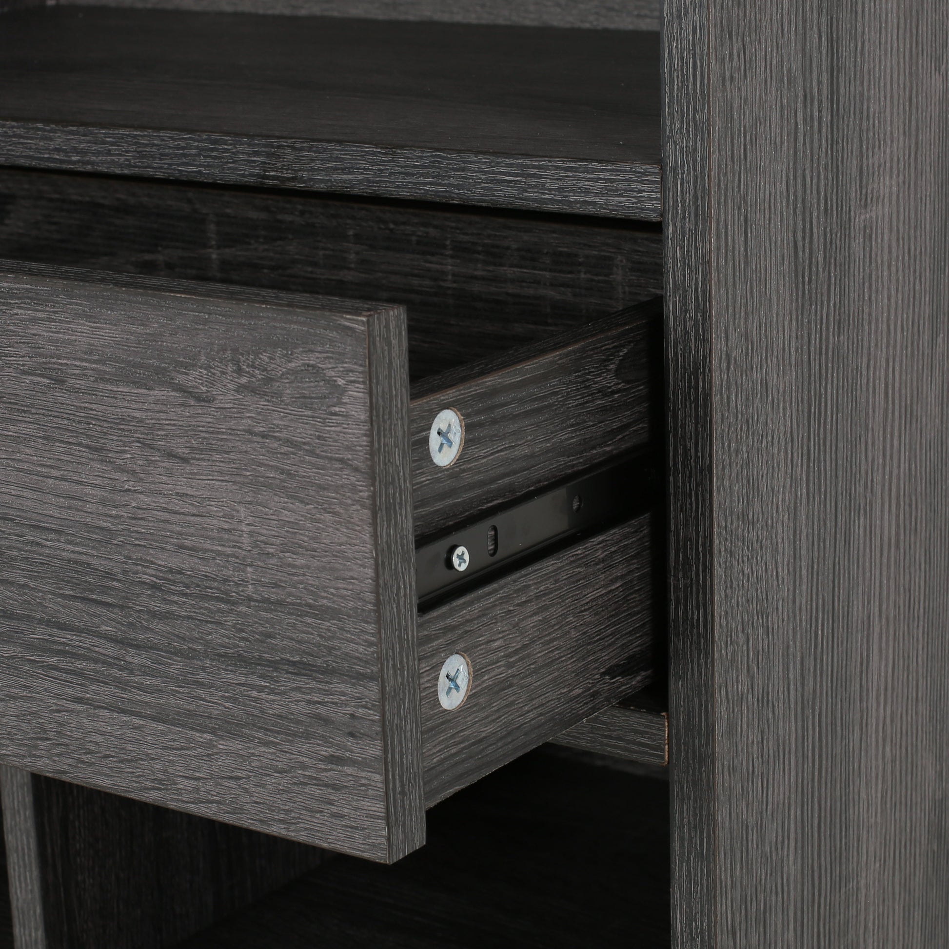 Dark wood grain drawer front with exposed metal drawer slide