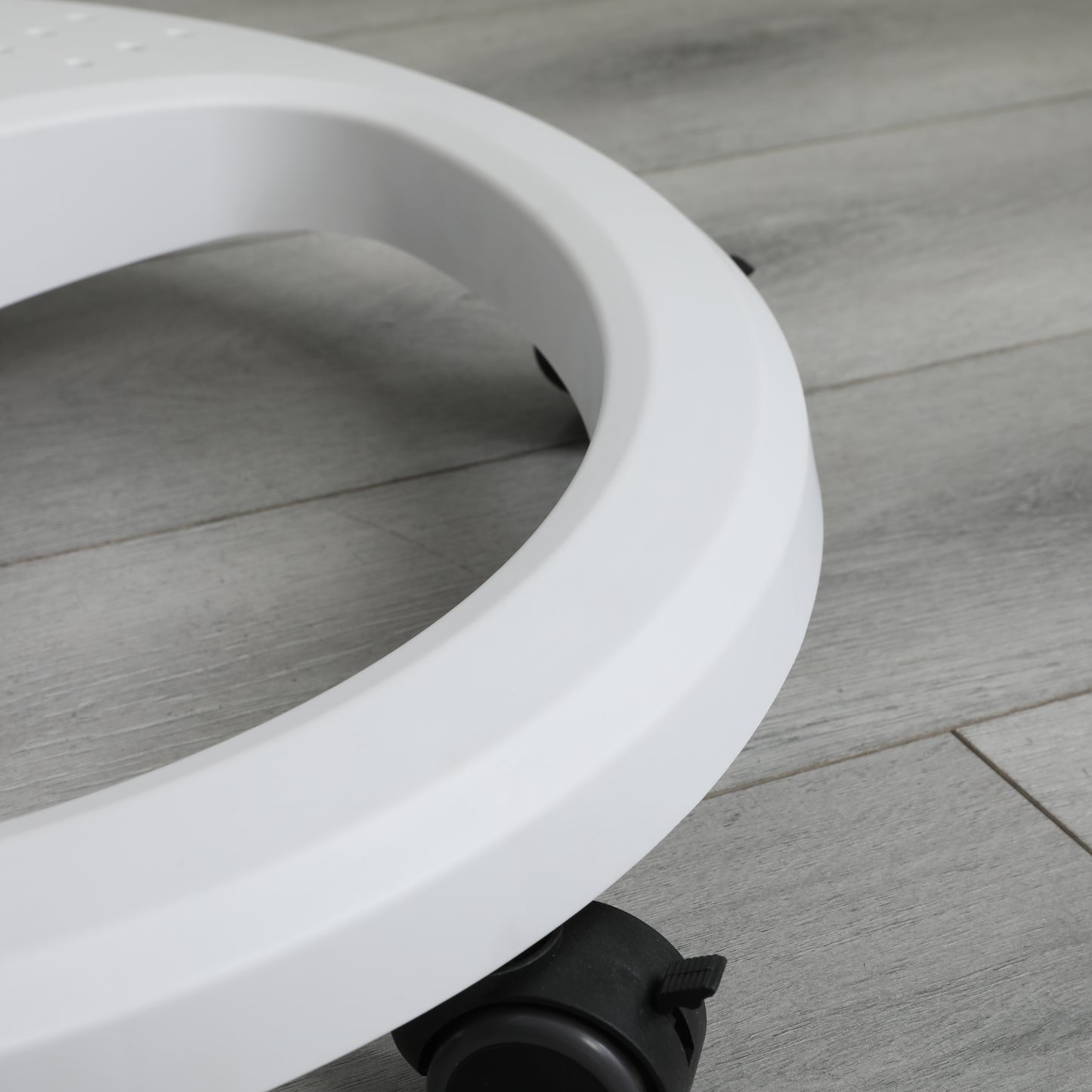 White wheeled stool base with swivel casters