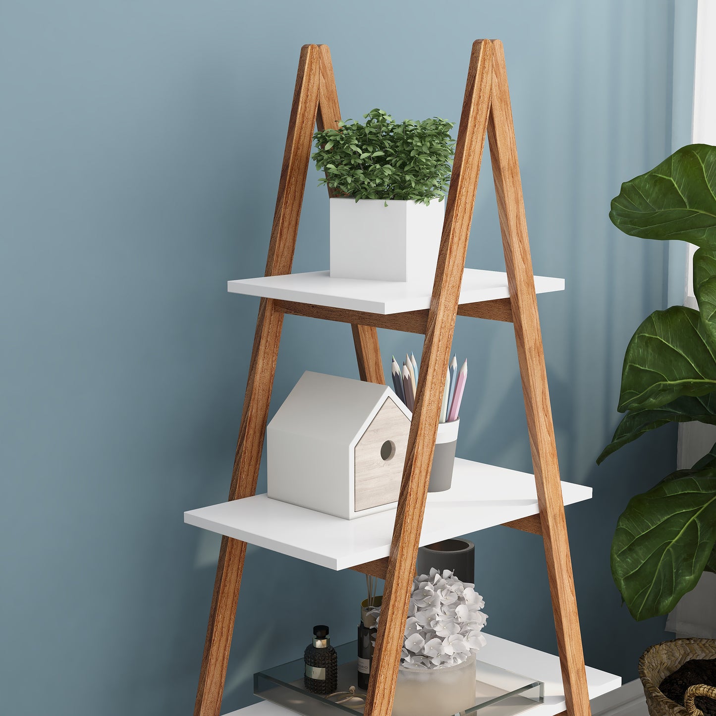 Wooden ladder shelf with white shelves holding decor