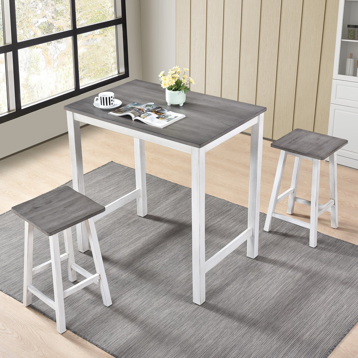 Gray wood top bar table with two white leg stools