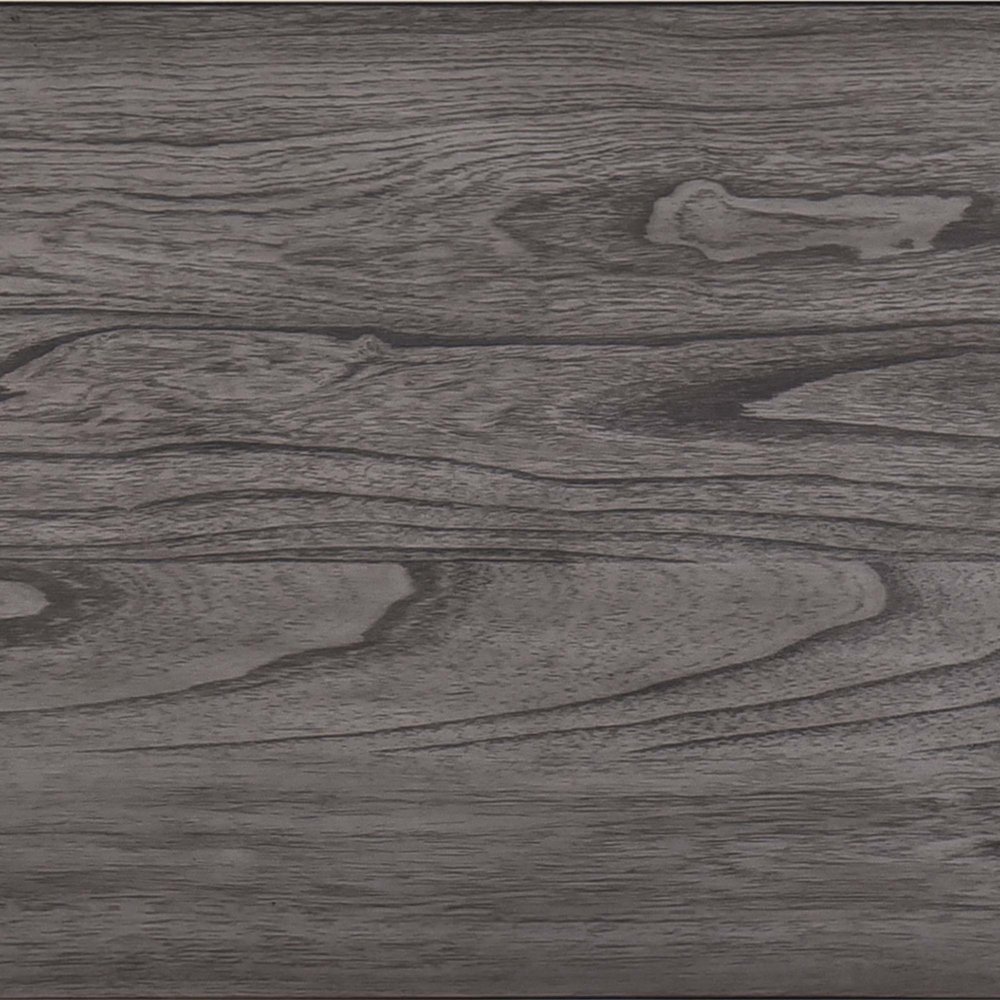 Dark gray wood grain laminate flooring with visible texture