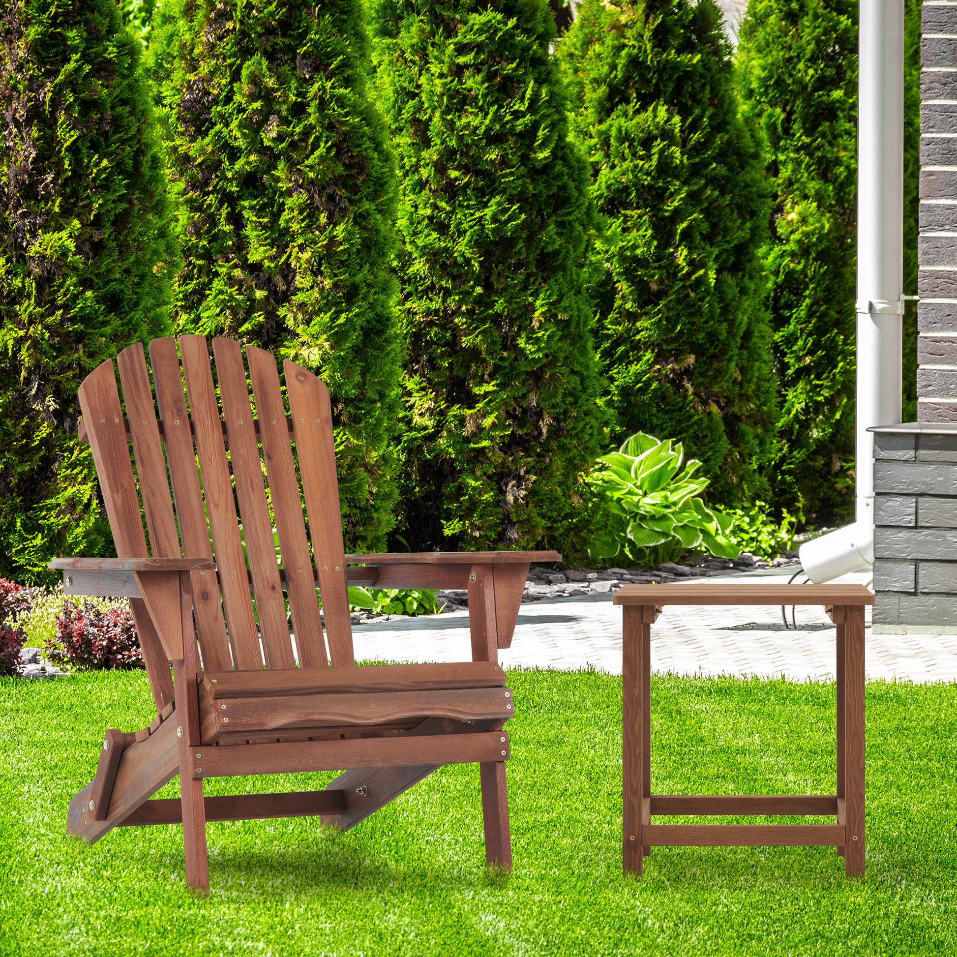 Brown wooden Adirondack chair and side table on green grass