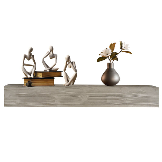 Textured gray wood floating shelf with abstract stone figures