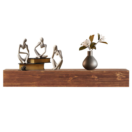 Abstract thinker sculptures in stone finish on wooden shelf with vase