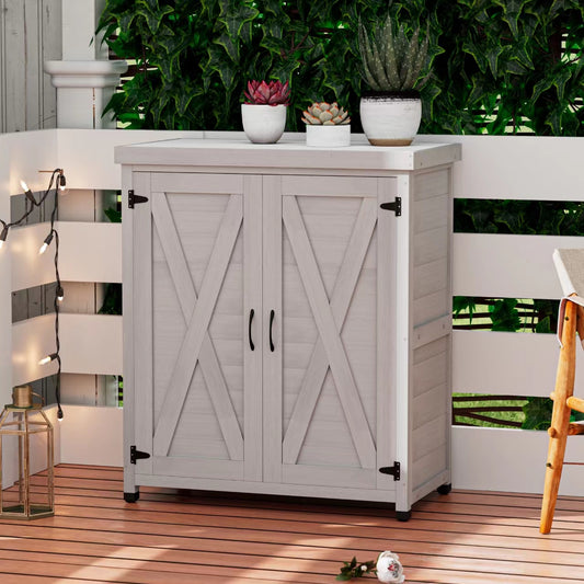 Light gray wood outdoor cabinet with double barnstyle doors