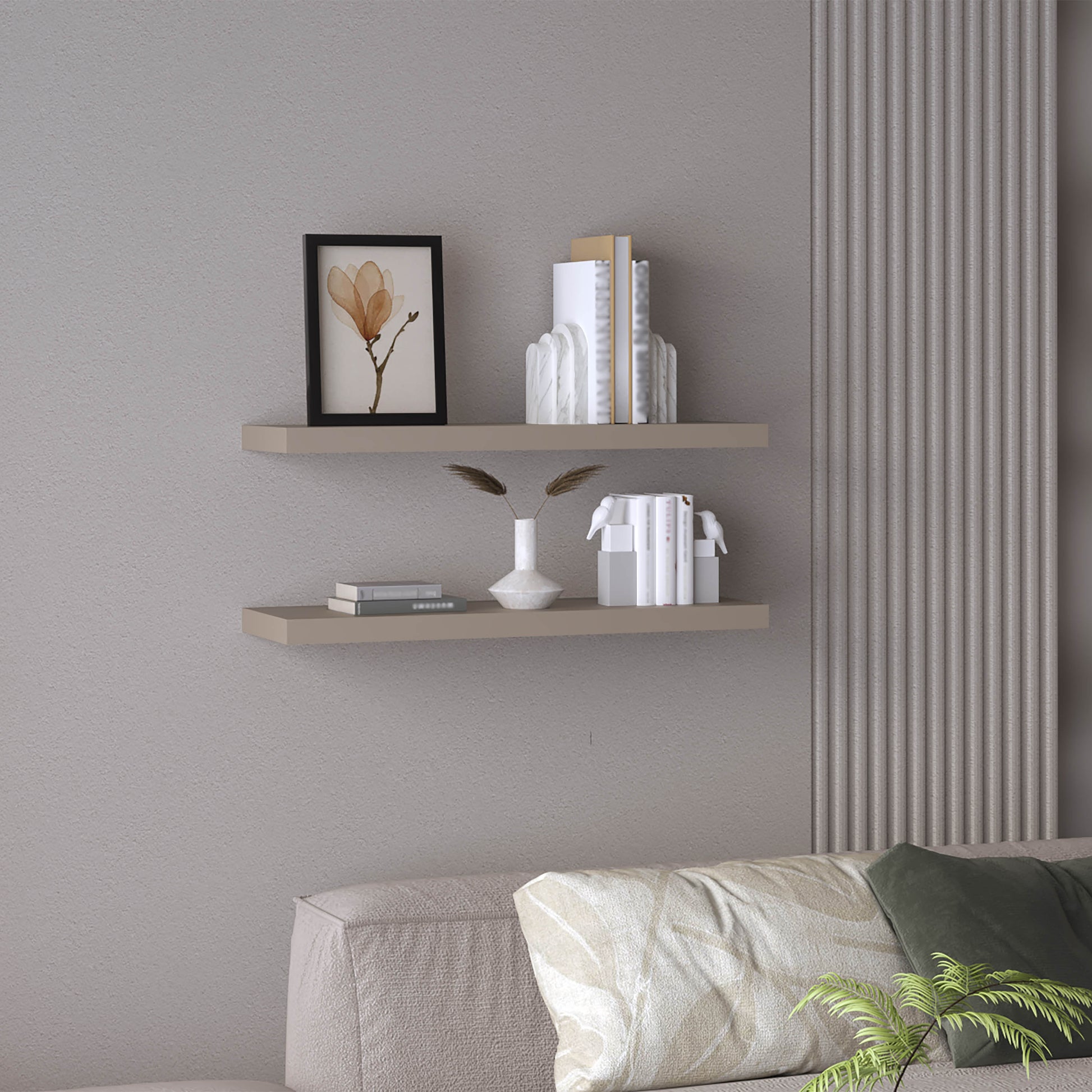Taupe floating shelf with framed floral art and books