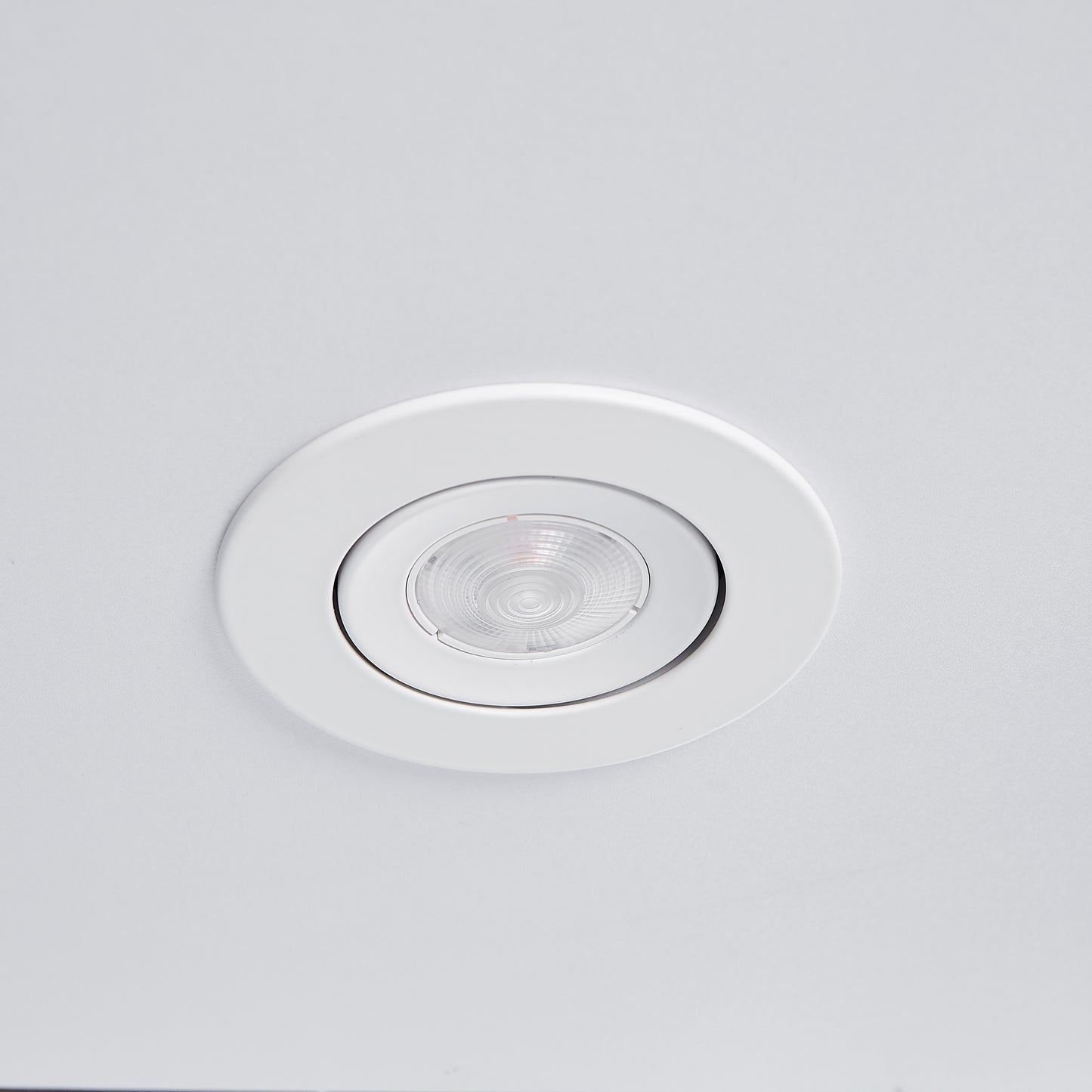 Flush mount white LED ceiling light with clear textured lens
