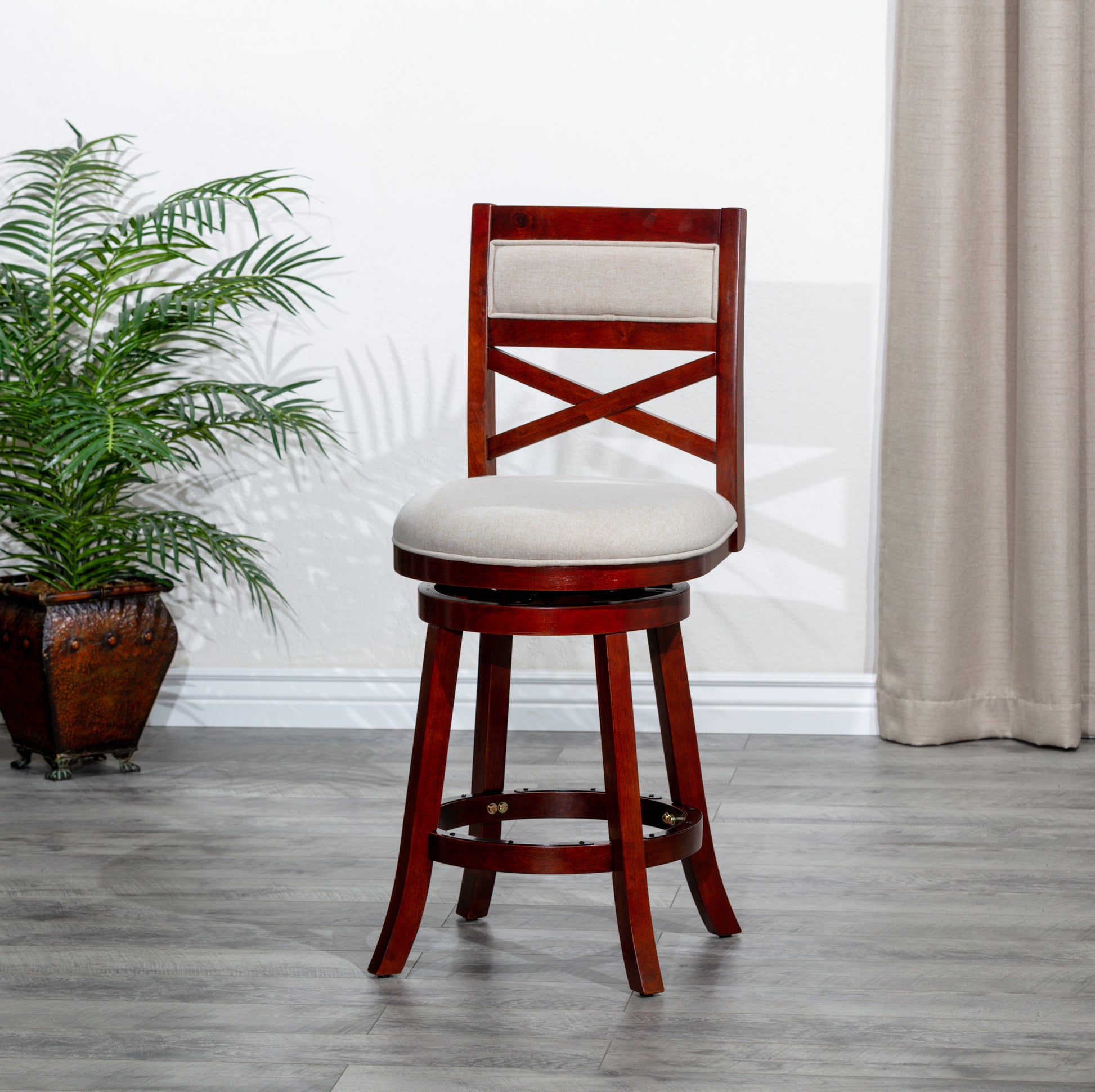 Cherry finish swivel bar stool with beige upholstered seat and backrest