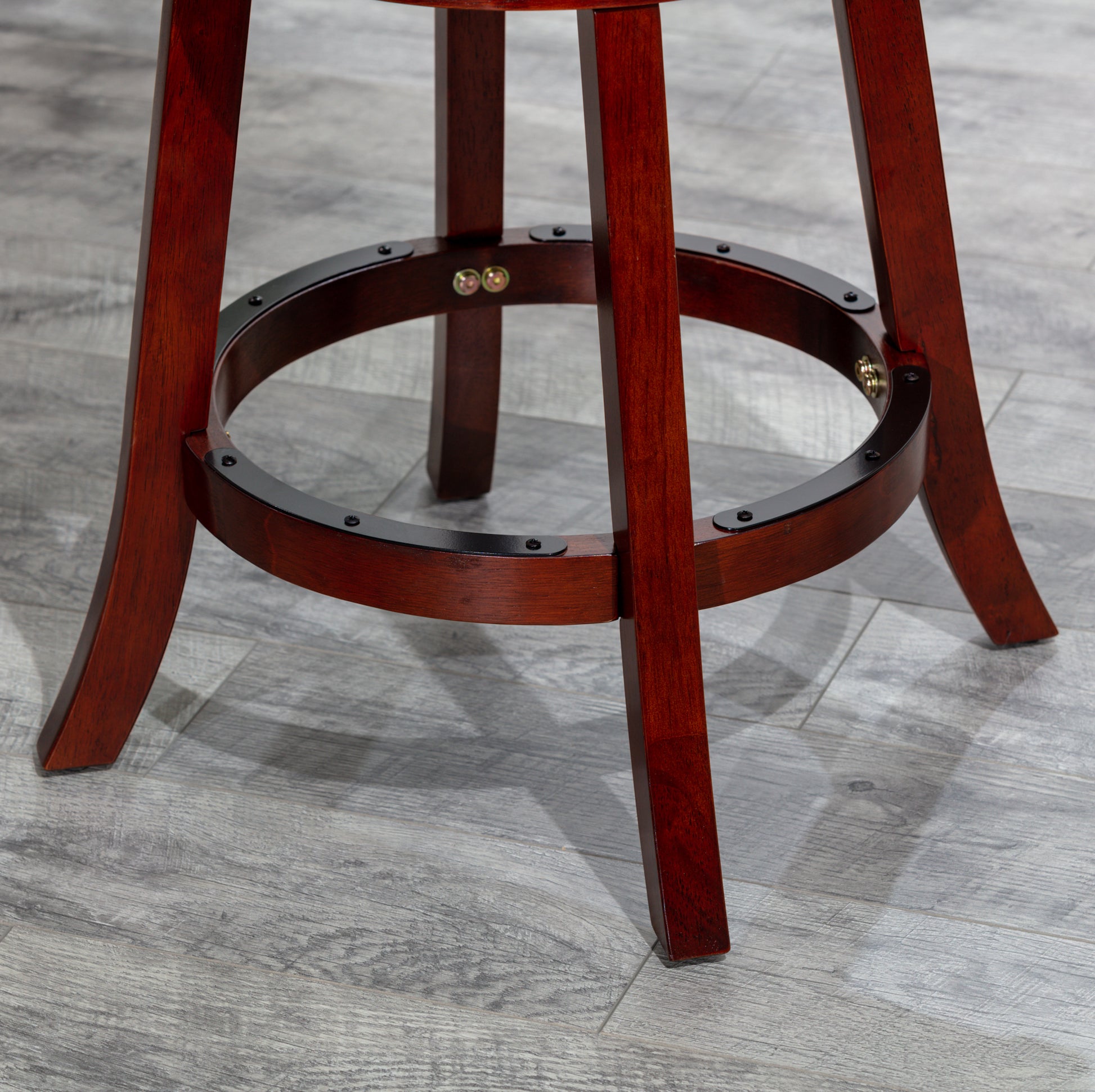 Red wooden bar stool base with black metal footrest ring and sturdy legs