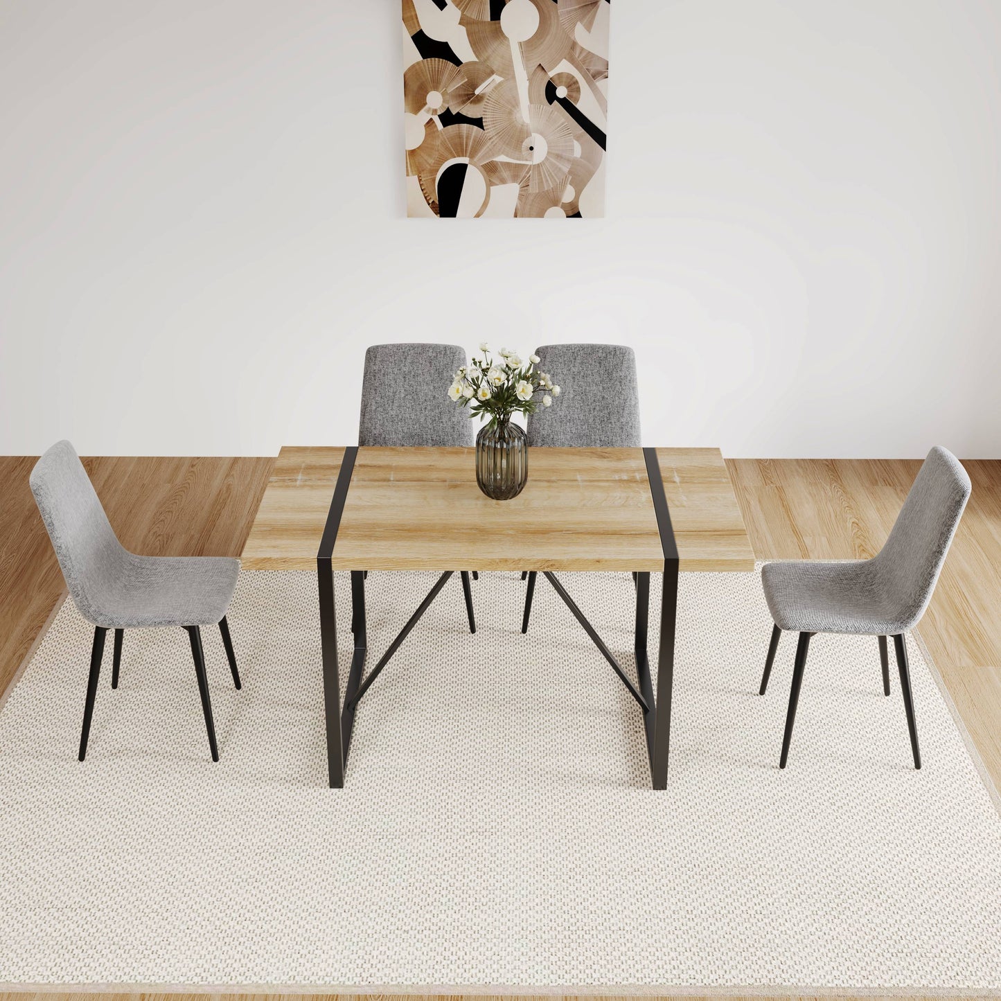Light oak dining table with black metal legs and grey fabric chairs