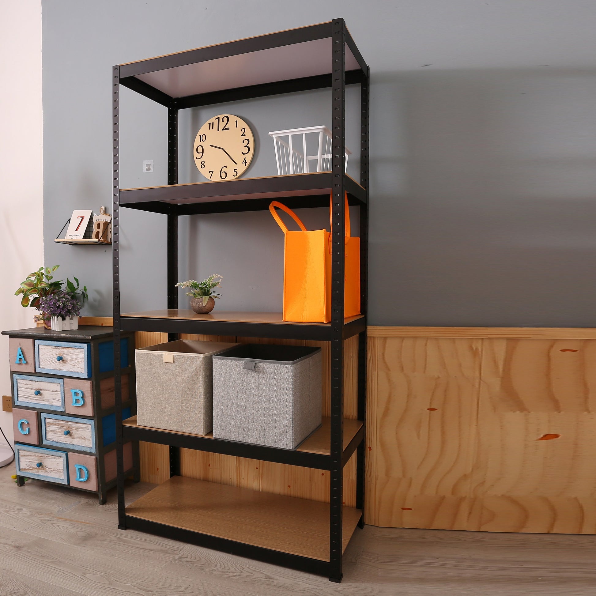 Black metal shelving unit with wood shelves