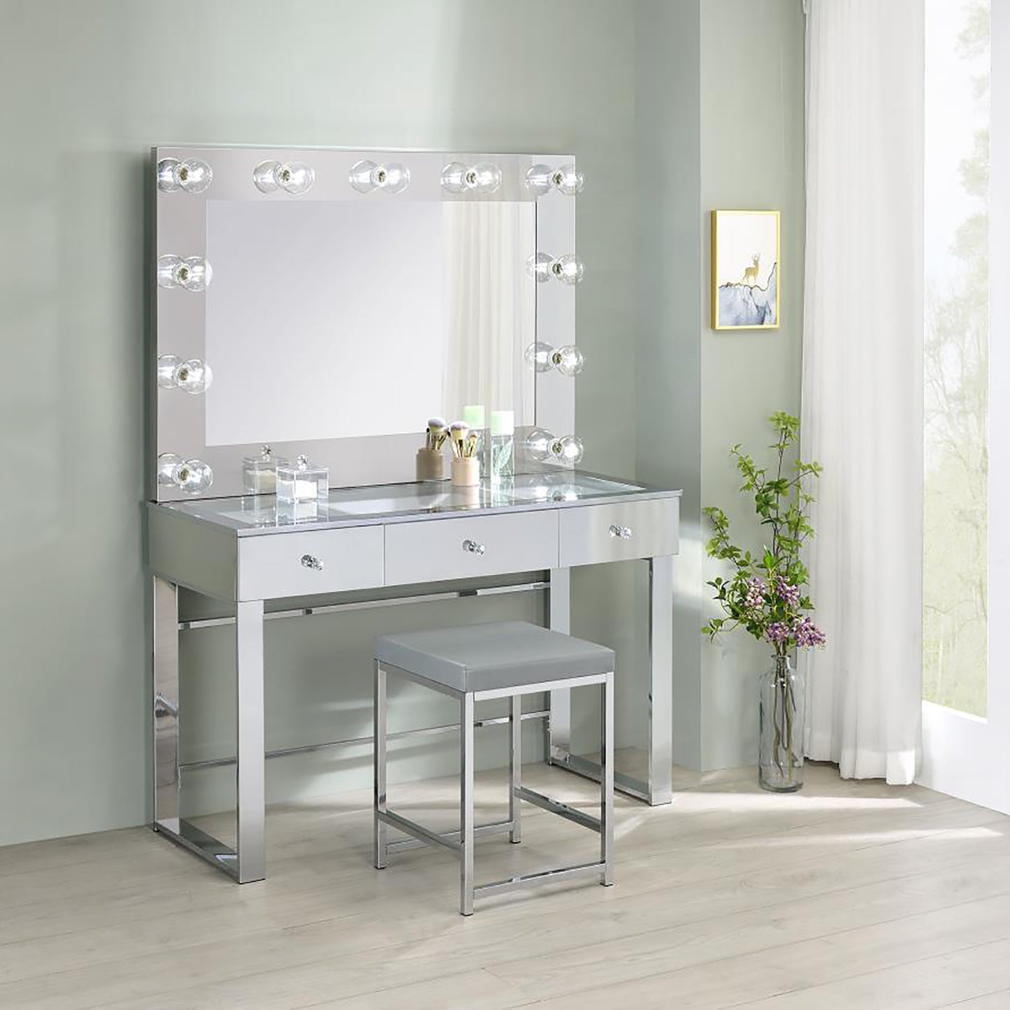 Hollywood vanity mirror with lights and a silver vanity set
