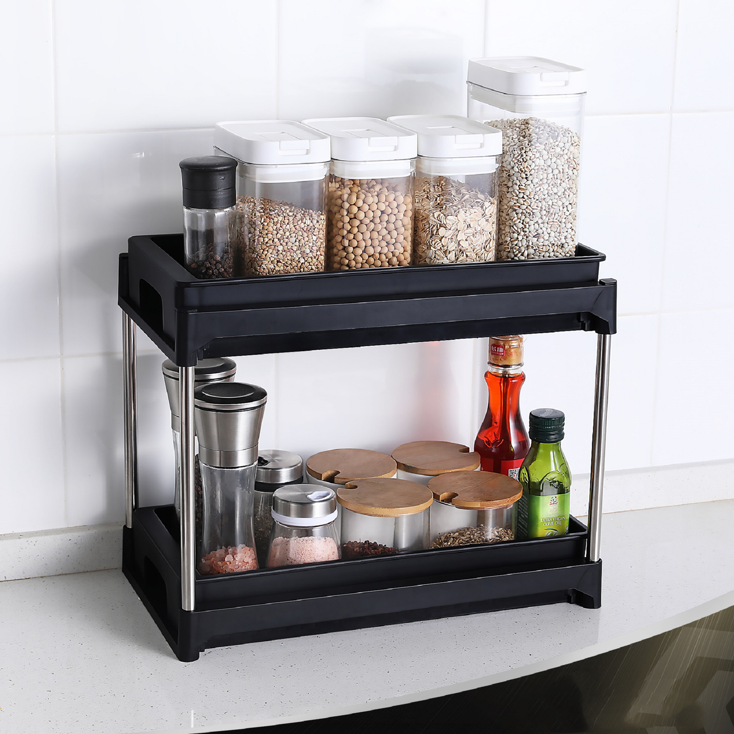 Black twotier kitchen spice rack with clear jars and bottles