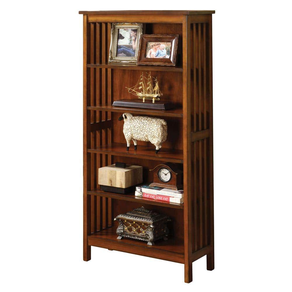 Antique brown barrister bookcase filled with decorative items including framed photos and a model ship