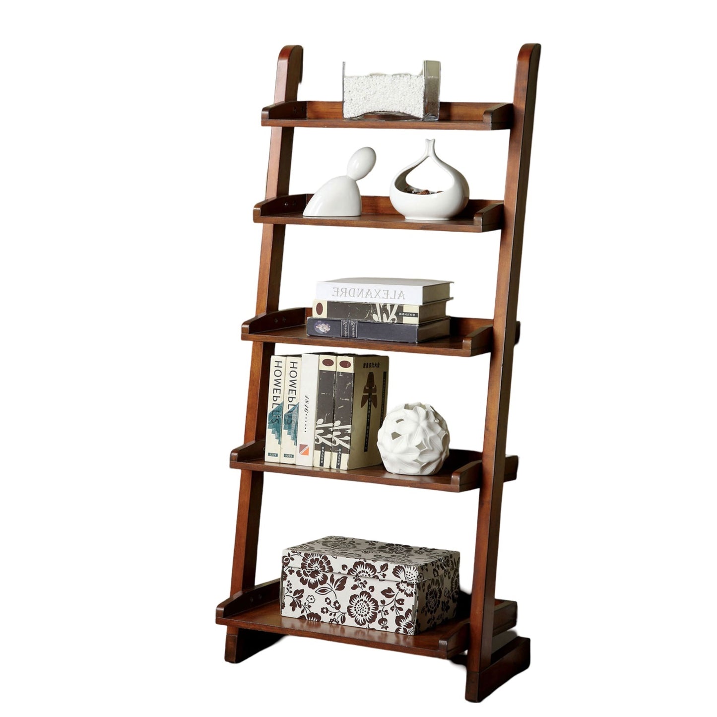 Dark wood ladder bookshelf with decorative items