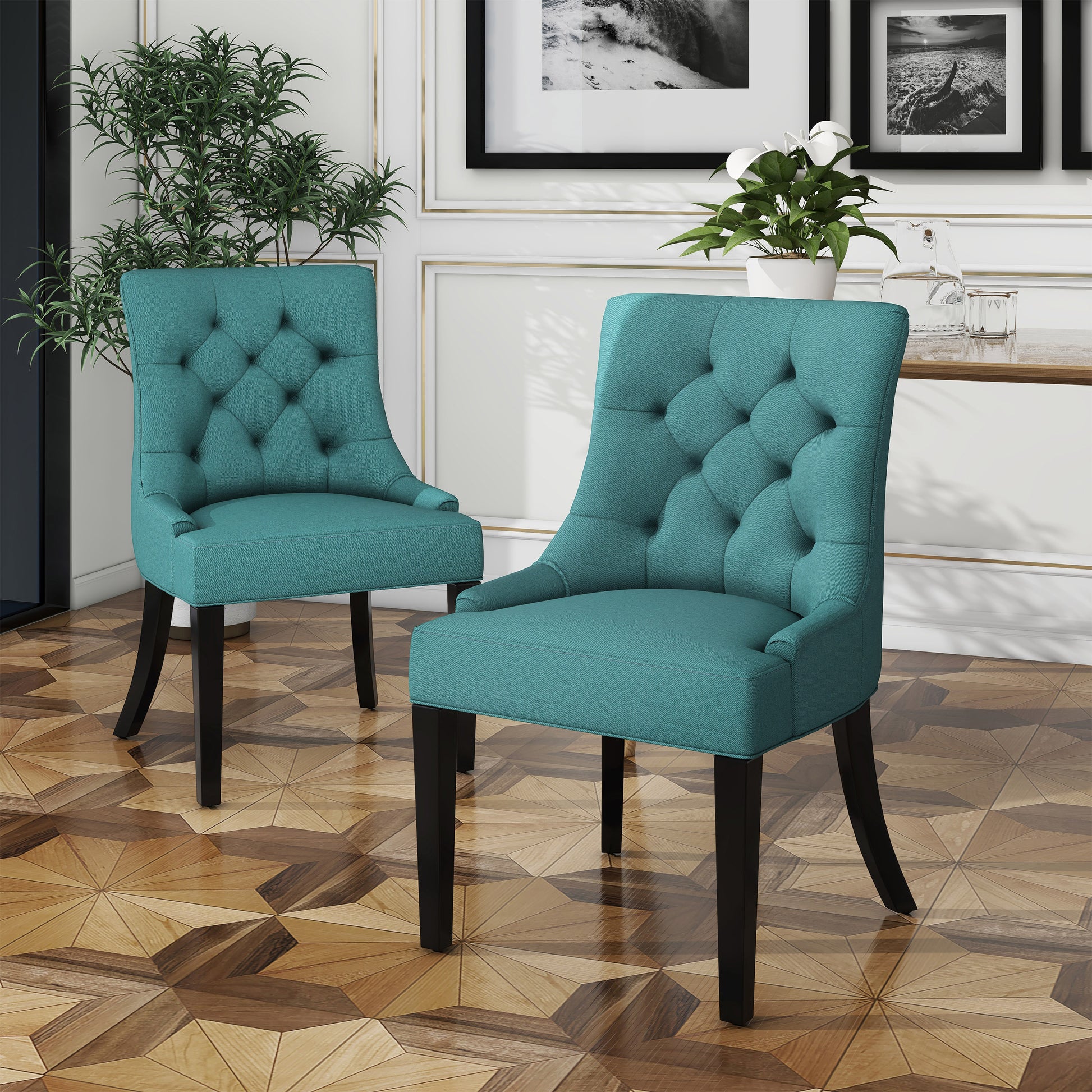 Teal tufted dining chair with black wooden legs and diamond tufting detail