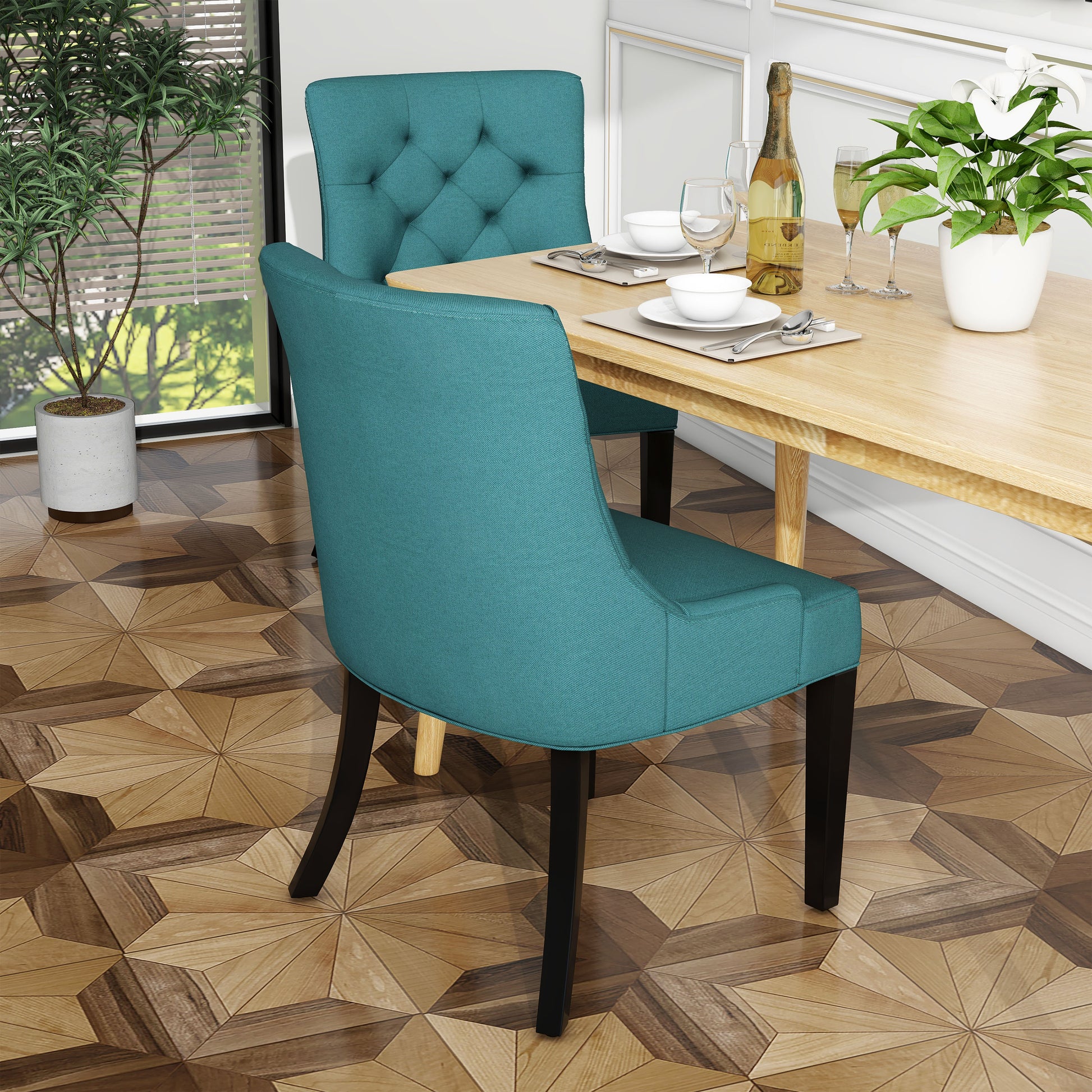 Teal upholstered dining chair with diamond tufting on back