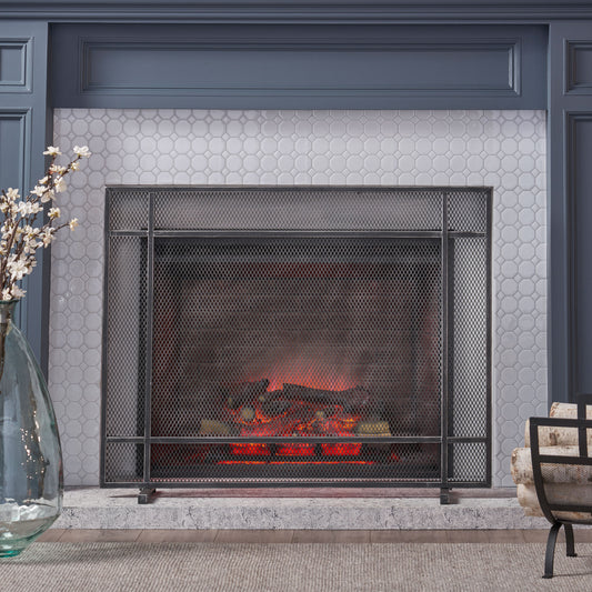 Industrial mesh fireplace screen with realistic faux logs