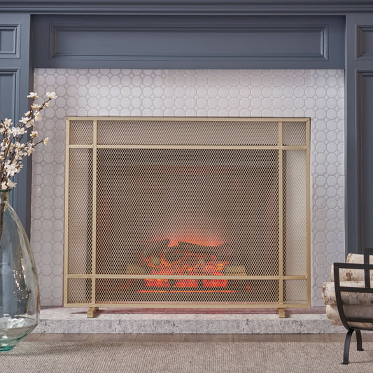 Gold metal fireplace screen with diamond mesh