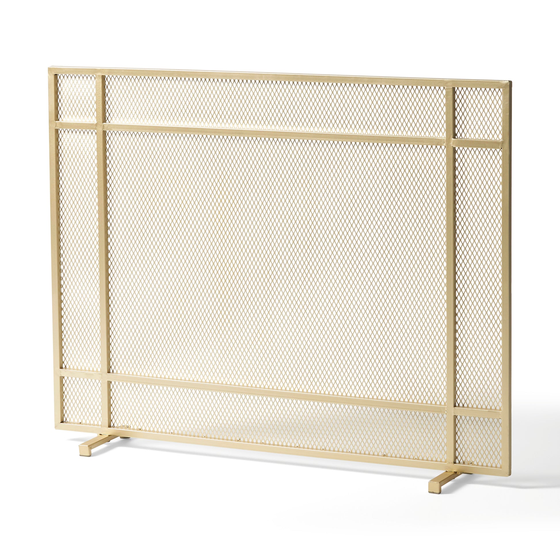 Gold metal fireplace screen with geometric mesh pattern