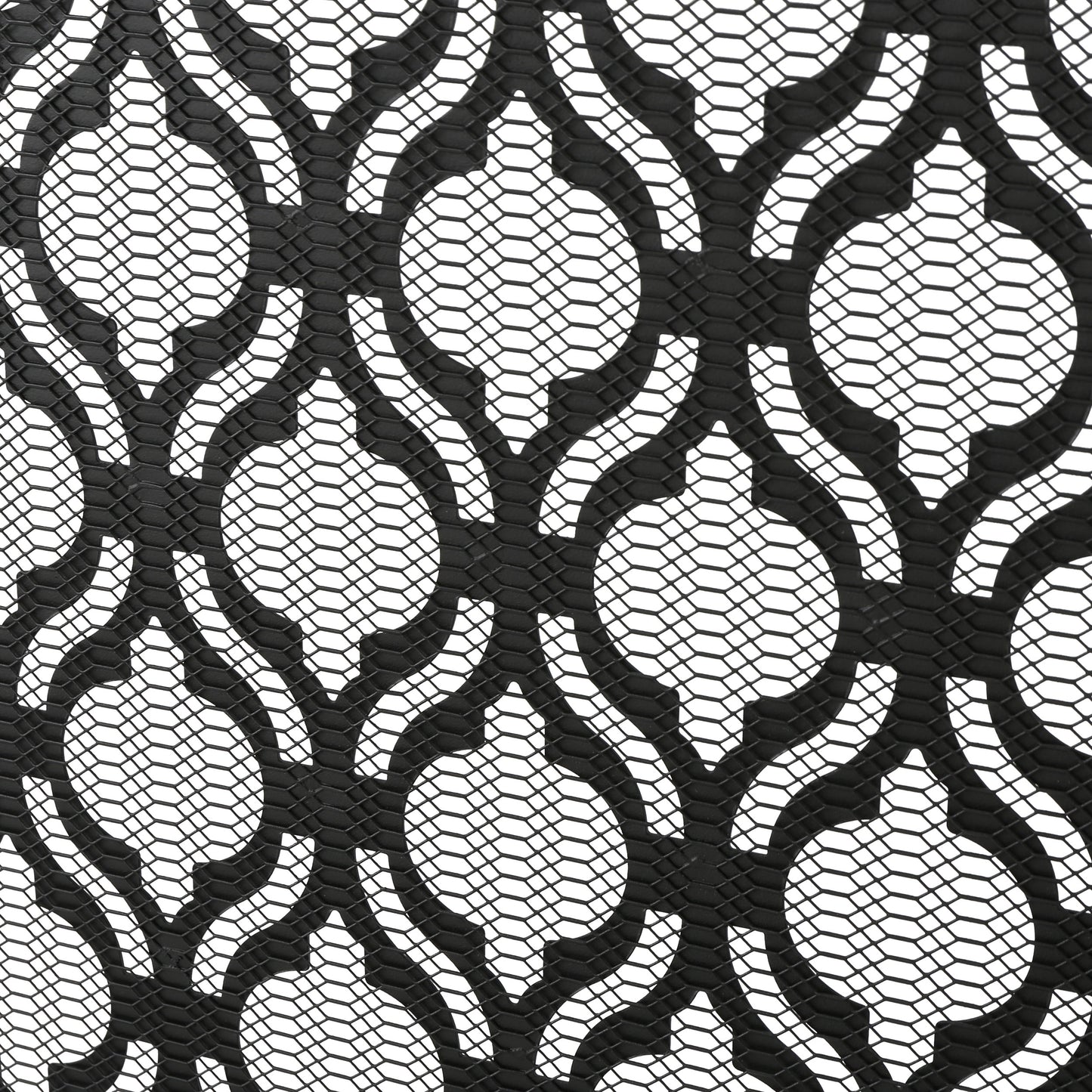 Decorative black metal mesh with an ornate quatrefoil pattern
